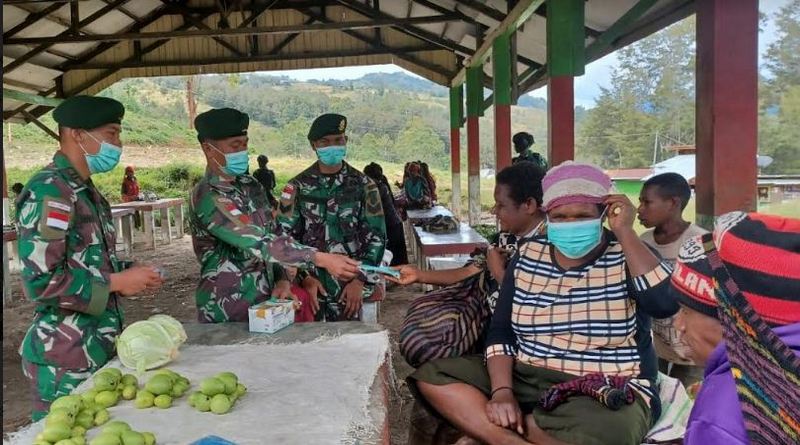 Satgas Yonmek Raider 412 Sosialisasikan Prokes di Lanny Jaya